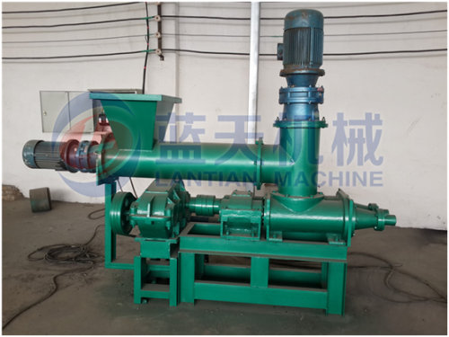 Charcoal extruding machine