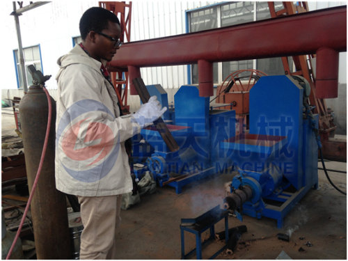 Biomass briquette machine